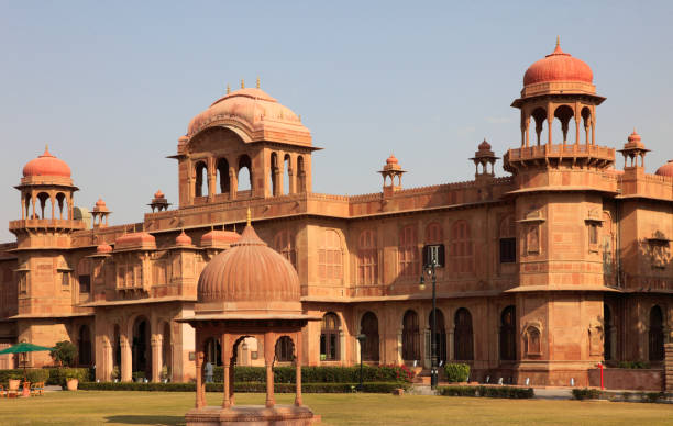 The grand facade of Lalgarh Palace at dusk.