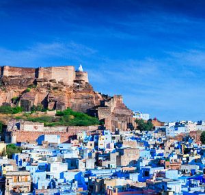 High angle cityscape of the Blue City and Mehrangarh Fort, Jodhpur, India.